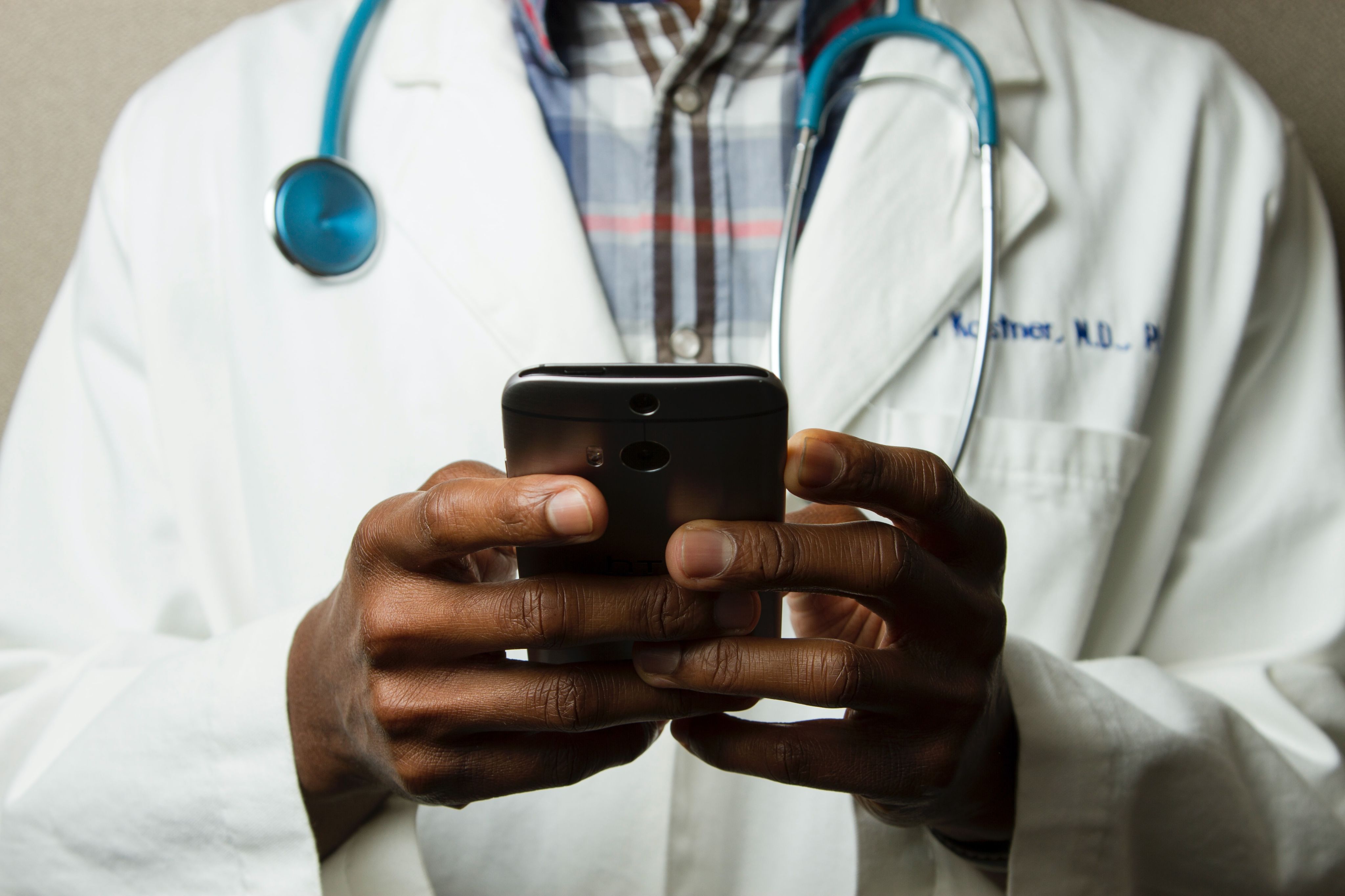 Doctor with an iPhone.