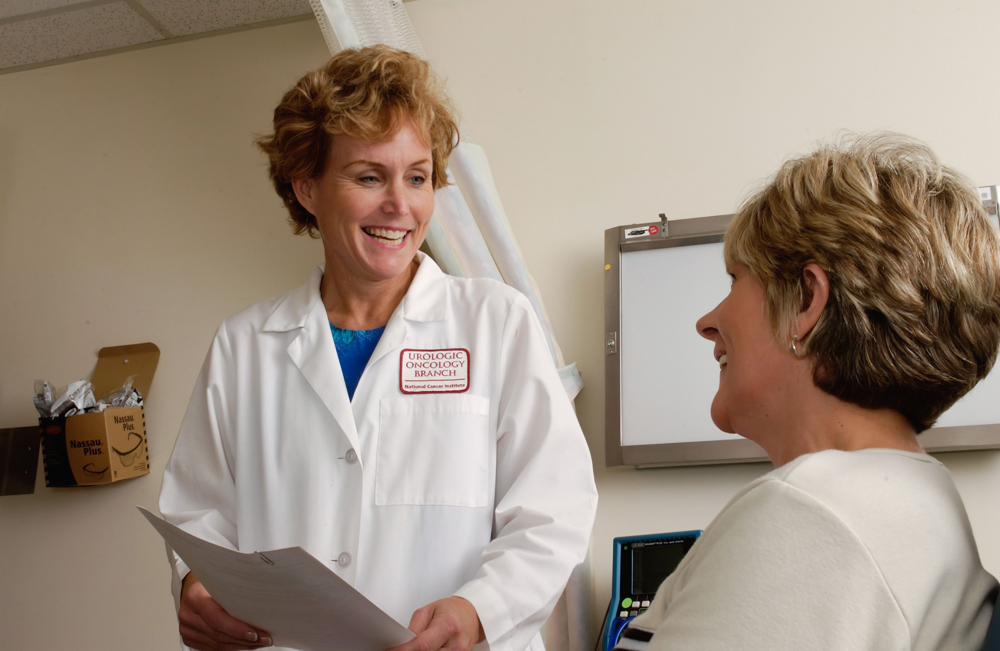 Female doctor treating patient.