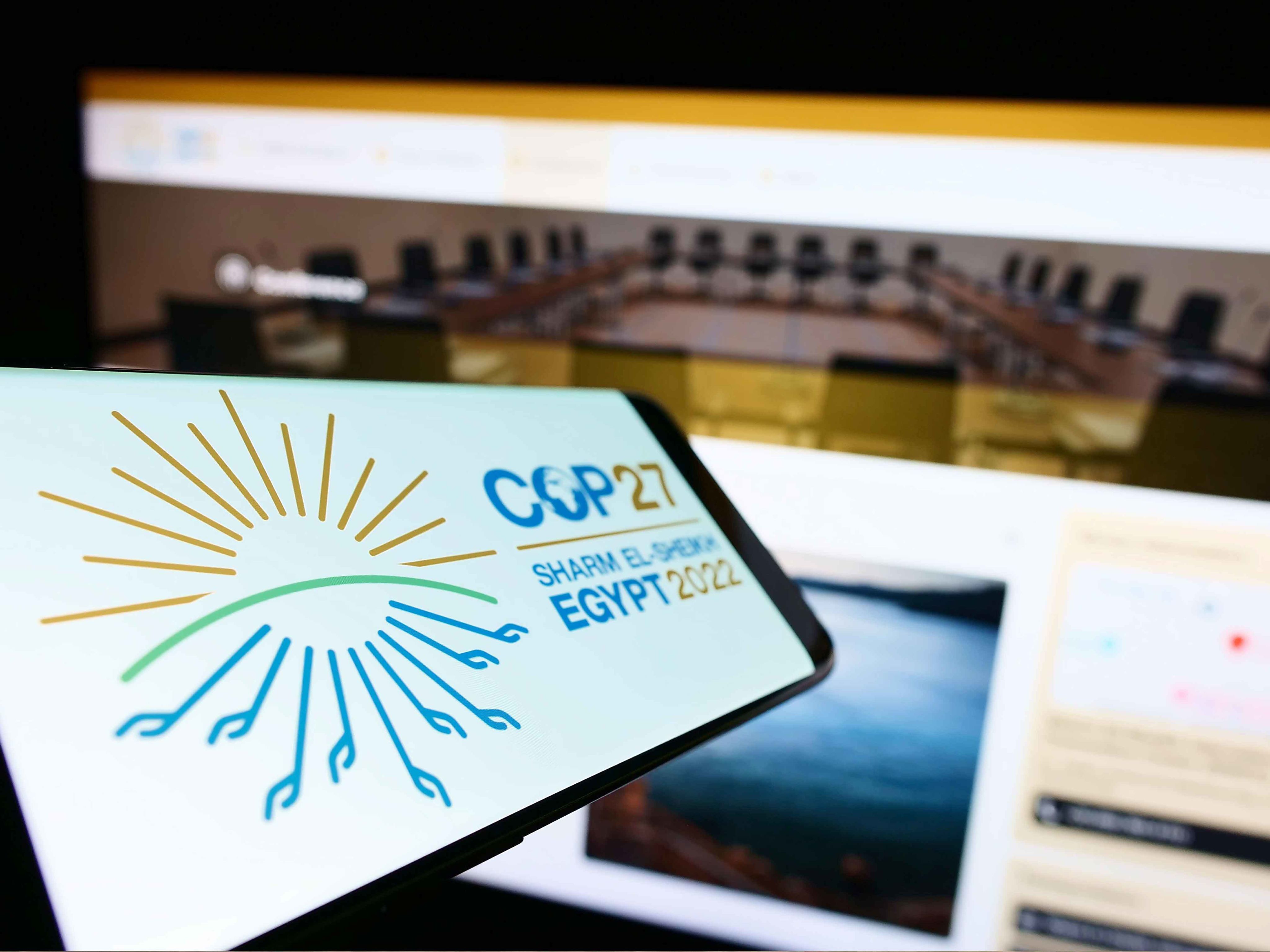 Cop27 logo displayed on smartphone screen