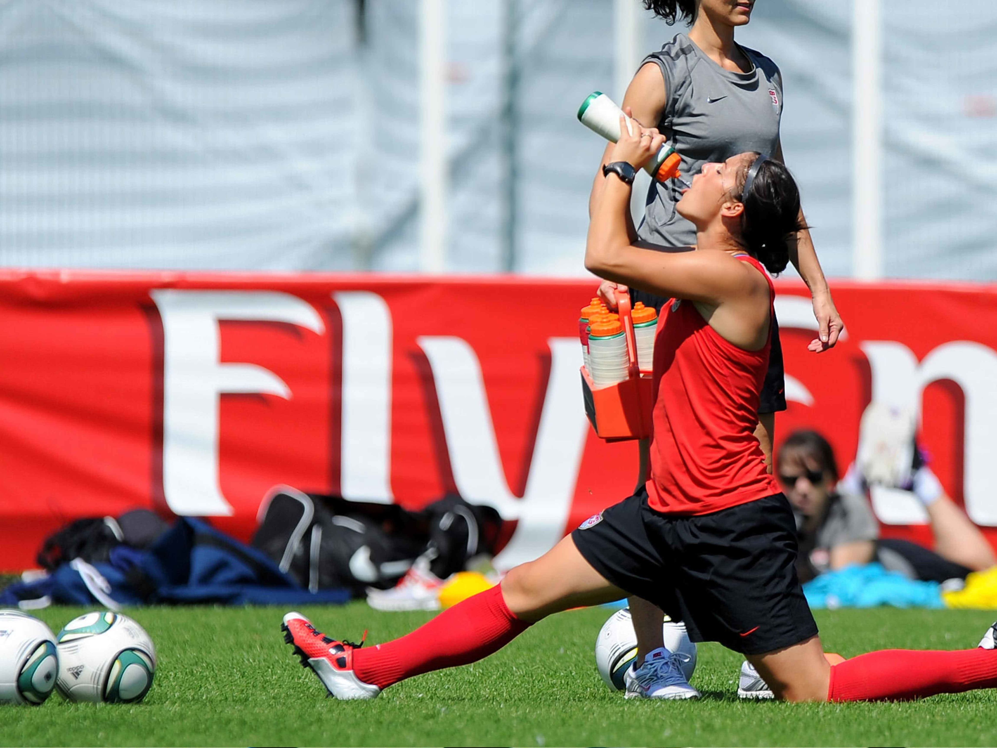 Alex Krieger of team USA drinks during a training session