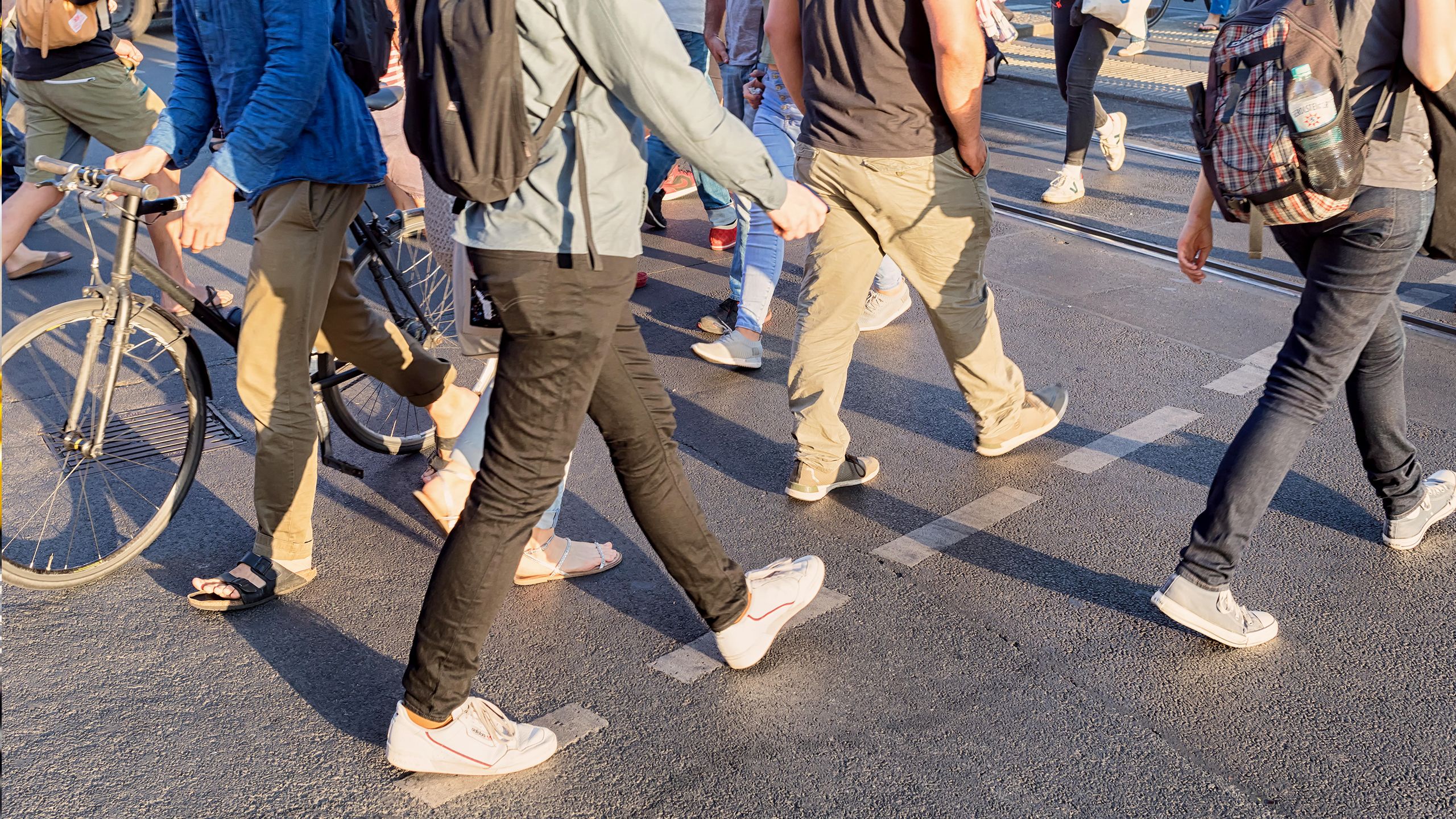 Pedestrians in Berlin, Germany, crossing a road