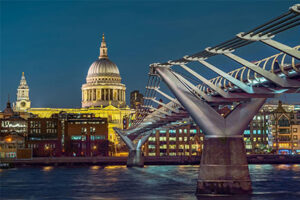Image of the Millennium Bridge and St Paul's Cathedral at night