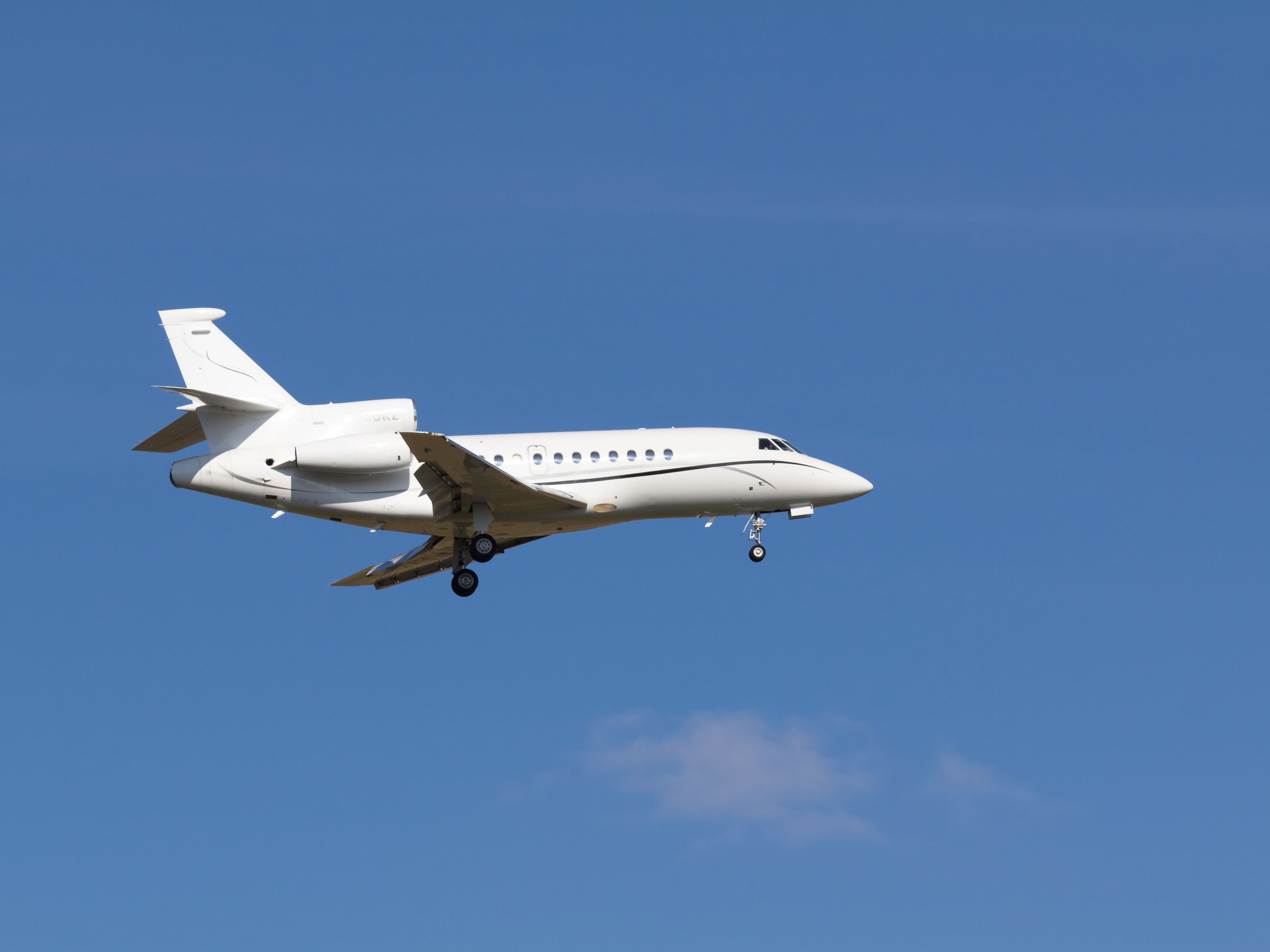 A private jet without any sign landing at Vienna airport