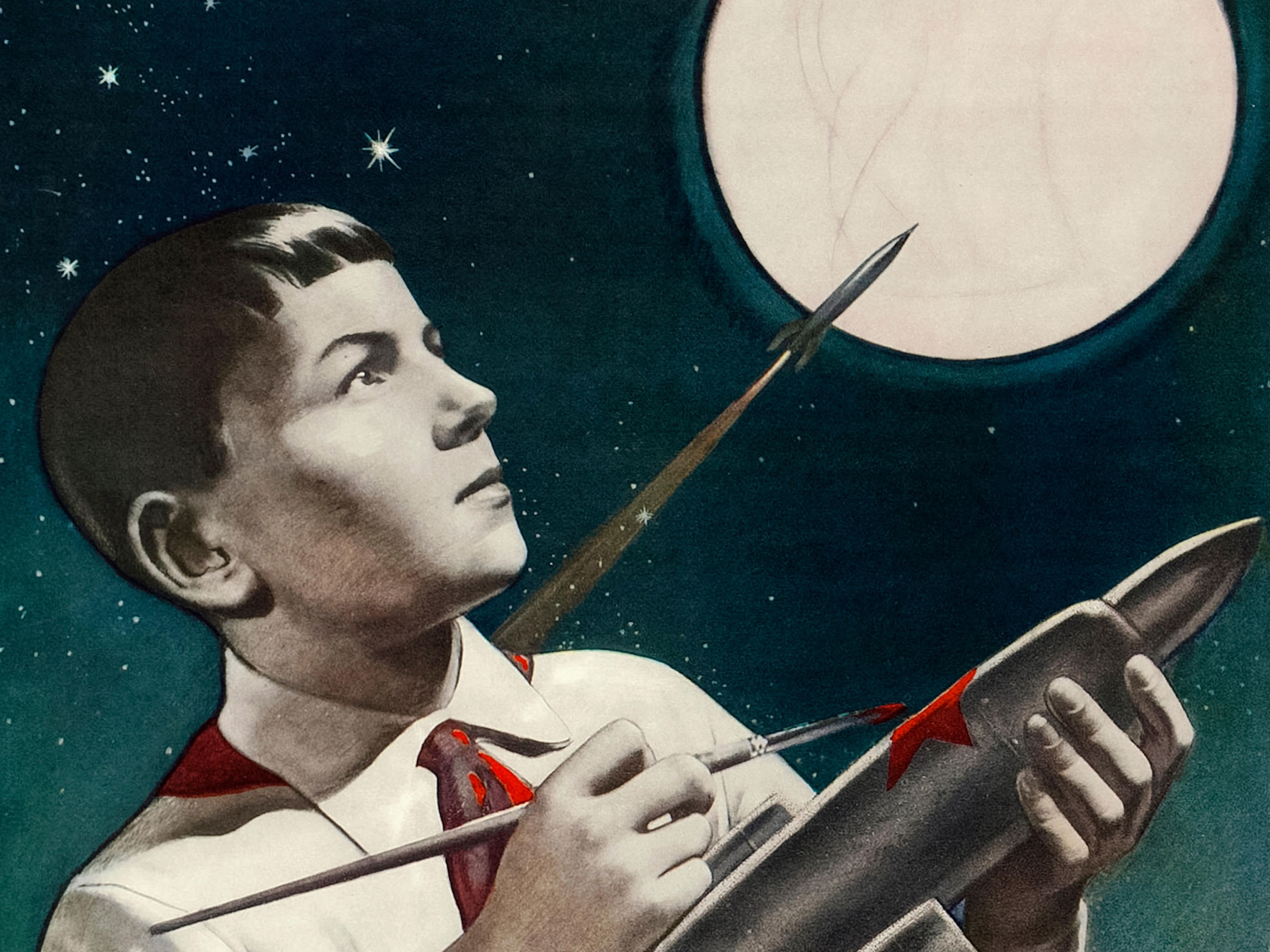 1950s Soviet propaganda poster depicting a young boy painting a toy rocket