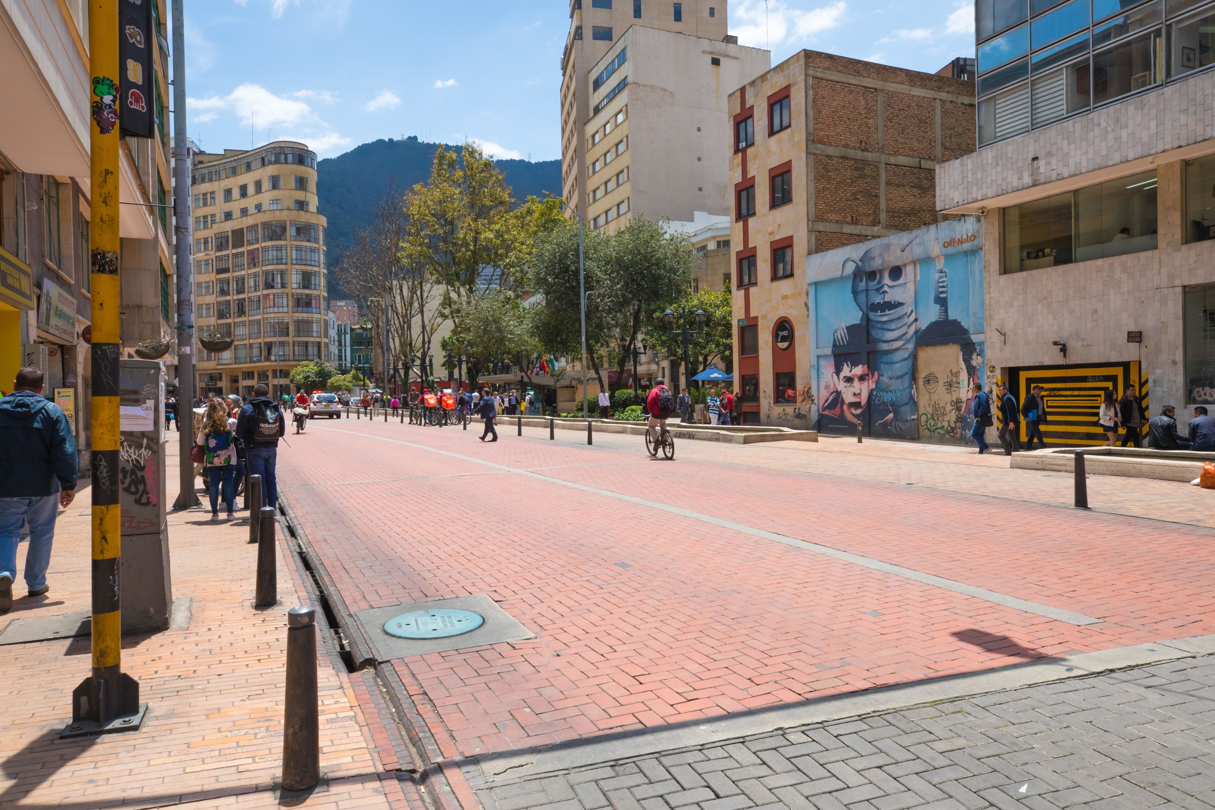 People riding bicycles in Bogota, Columbia.