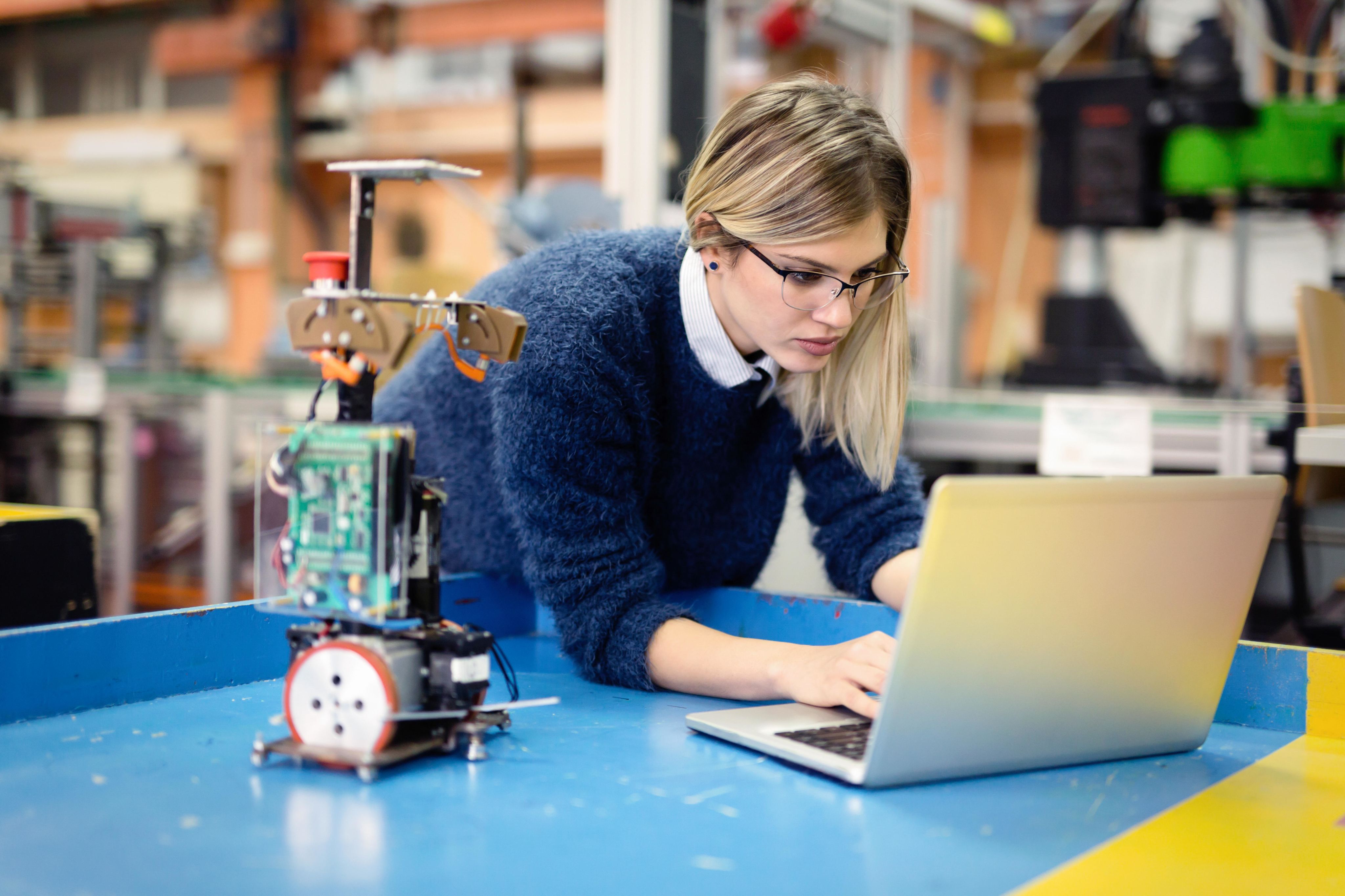 Woman engineer working on a computer