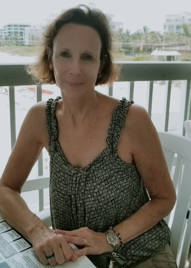 Picture of Cynthia Klivecka, Production Editorial Manager, Taylor & Francis, outside at a restaurant on the water.